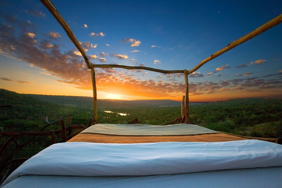Outdoor bed with stunning view of green countryside