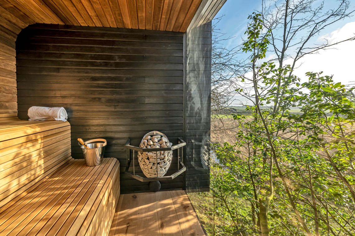 Photo of the sauna at Happenoak Treehouse