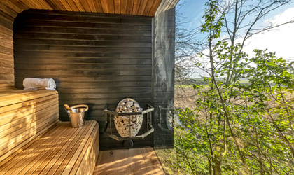 Photo of the sauna at Happenoak Treehouse