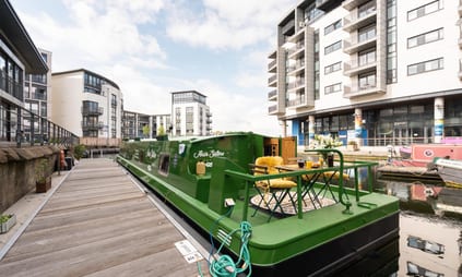 Holiday let boat in Edinburgh, offering scenic views of the city from the water